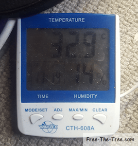 Themometer showing 33 degrees in the grow house